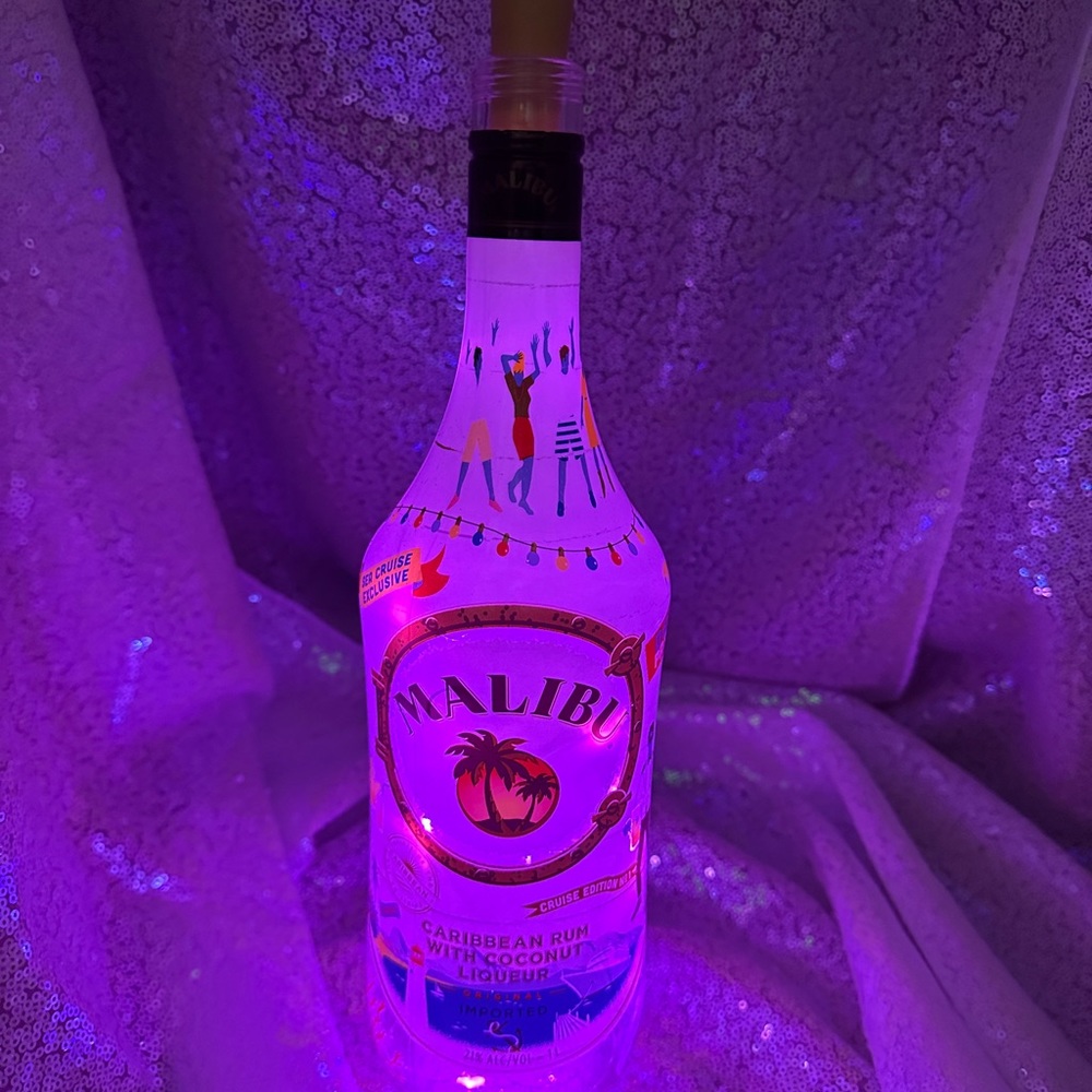 Bar back accent light, party accent or night light Malibu pink light bottle.